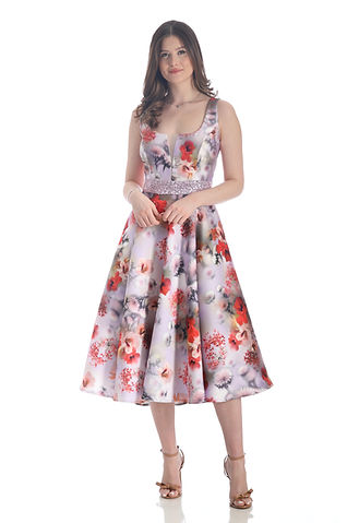 A high fashion model wearing a Lorellana Couture Mother of the Bride Cocktail dress.