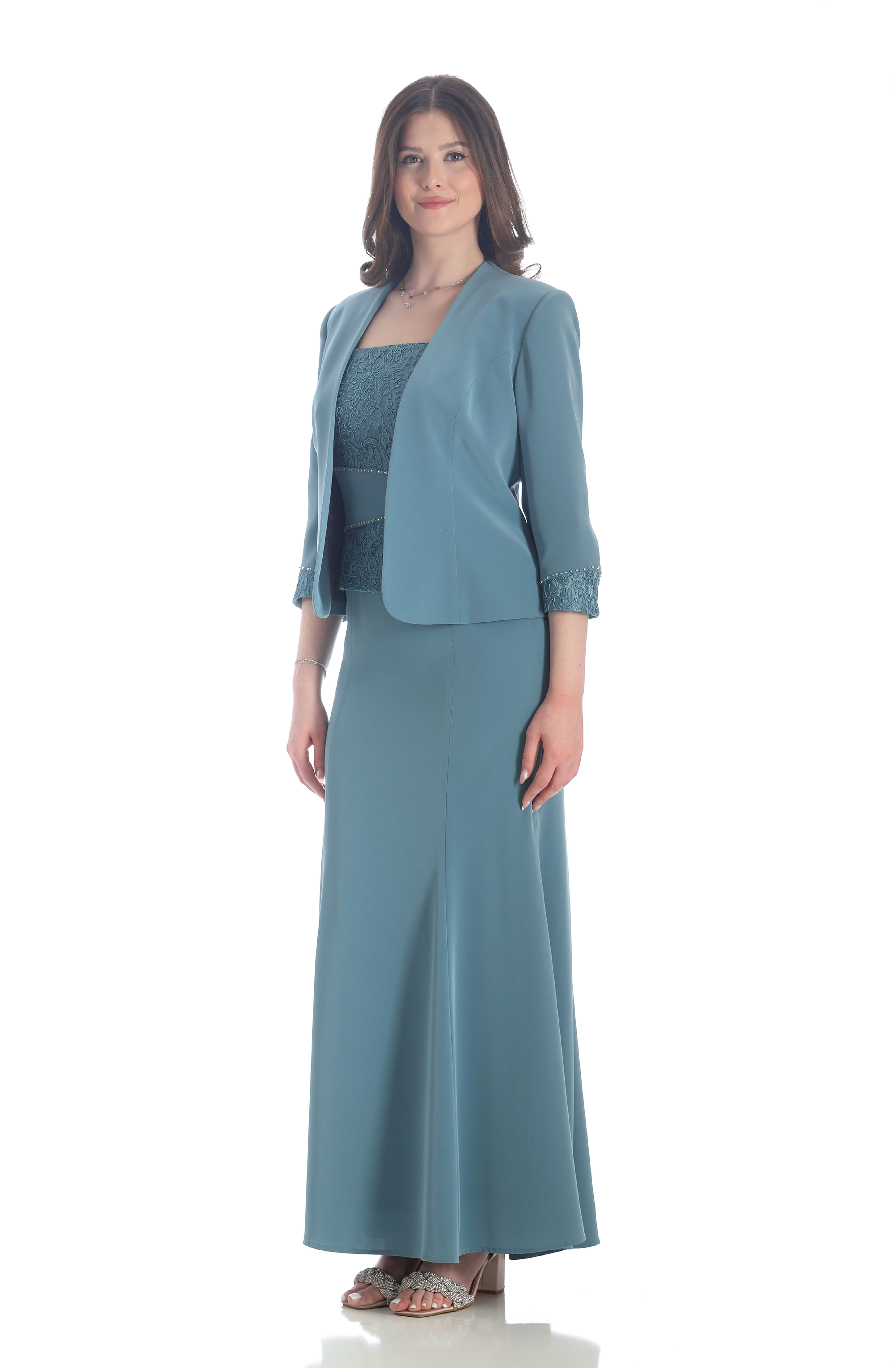 A high fashion model wearing a Lorellana Couture Mother of the Bride dress