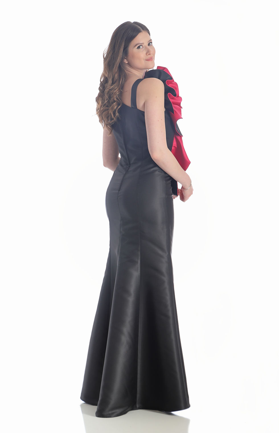 Thumbnail: A high fashion model wearing a Lorellana Couture Mother of the Bride dress