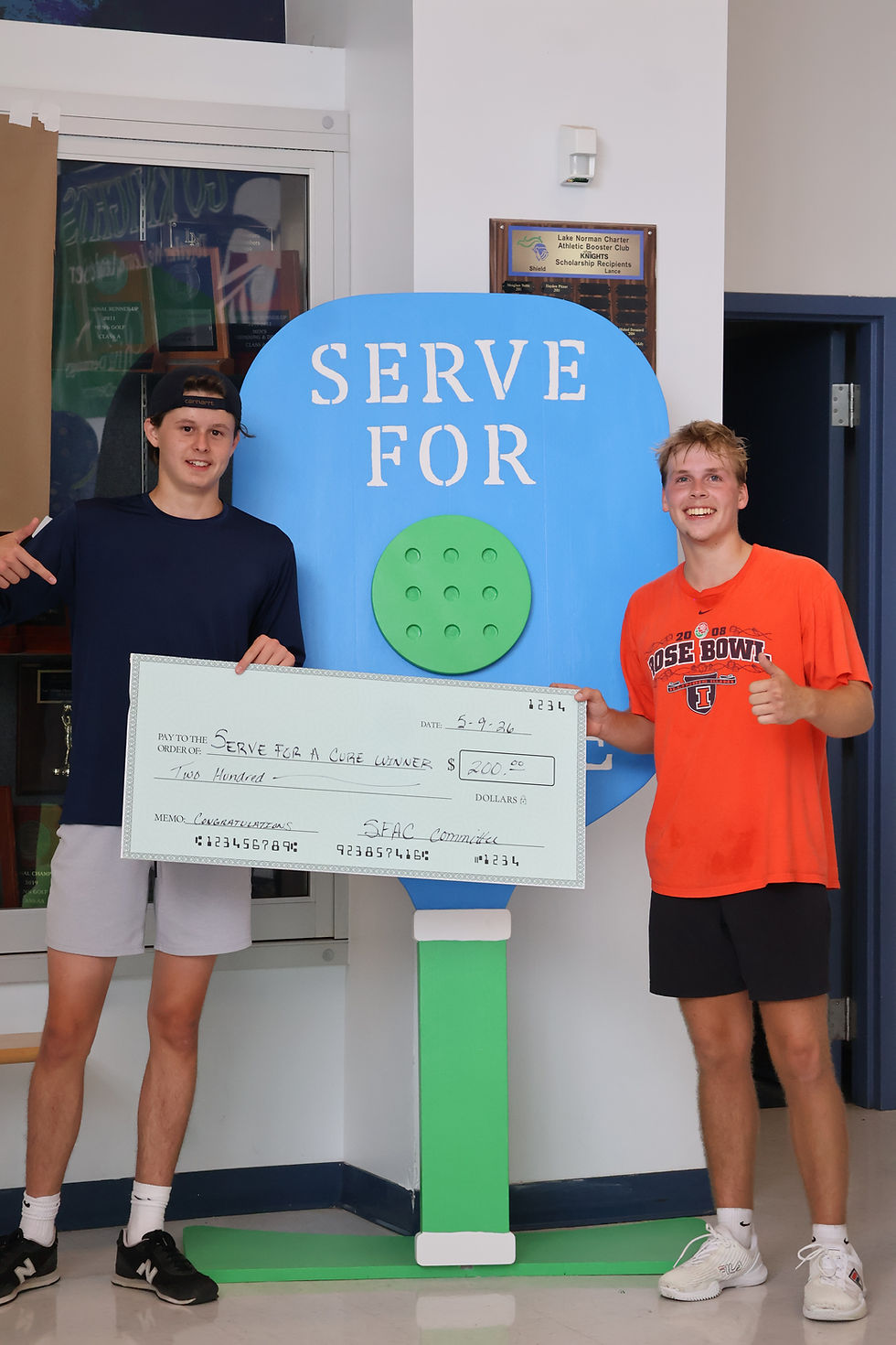 hudson and gabe holding the check.JPG