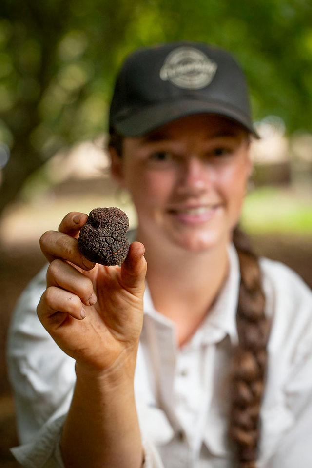 Thea holding a truffle