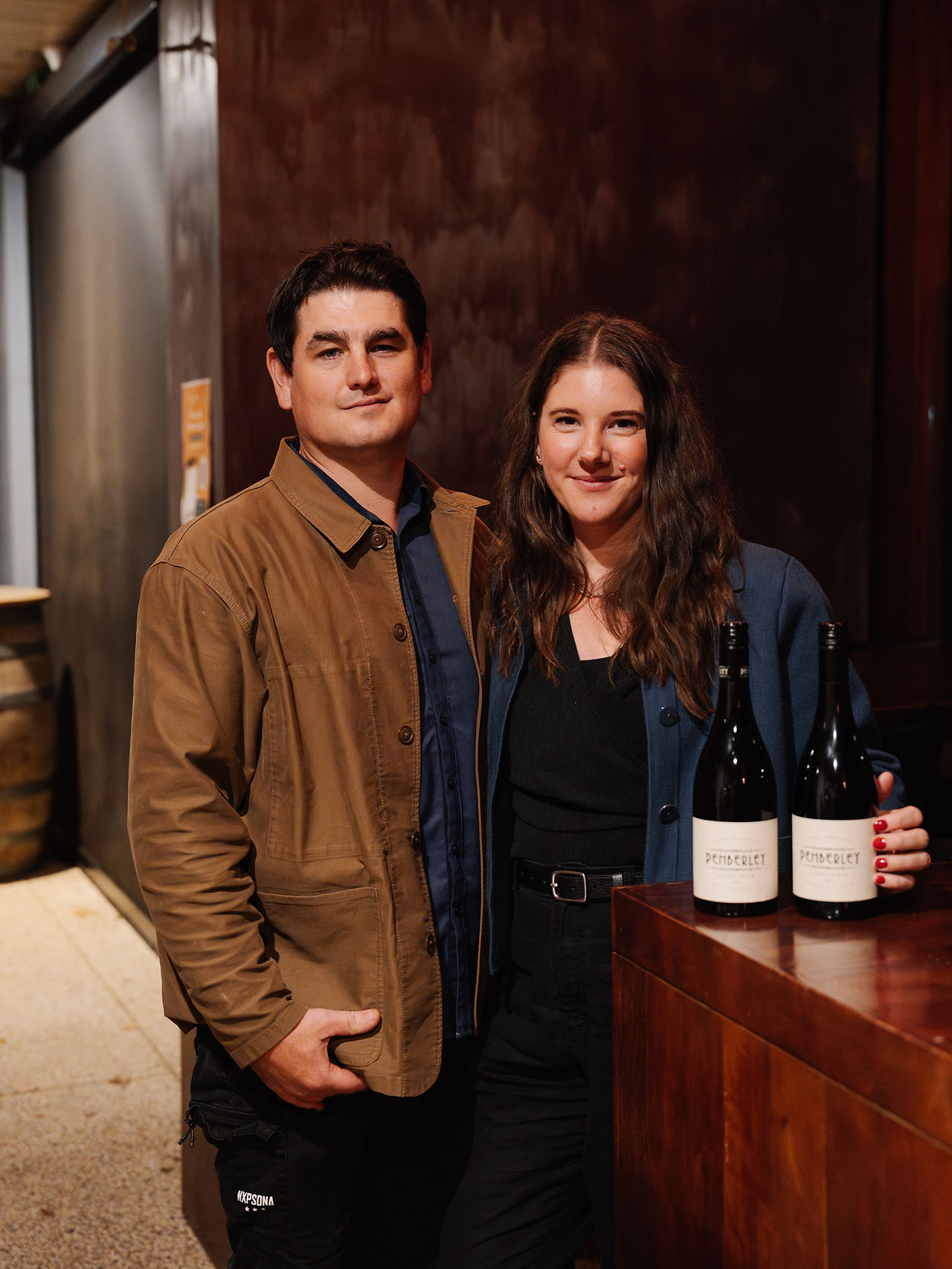 Couple holding wine