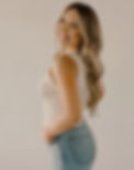A photo of Kiley Piini, a salon stylist. She offers hair and head spa services and is part of the salon team.