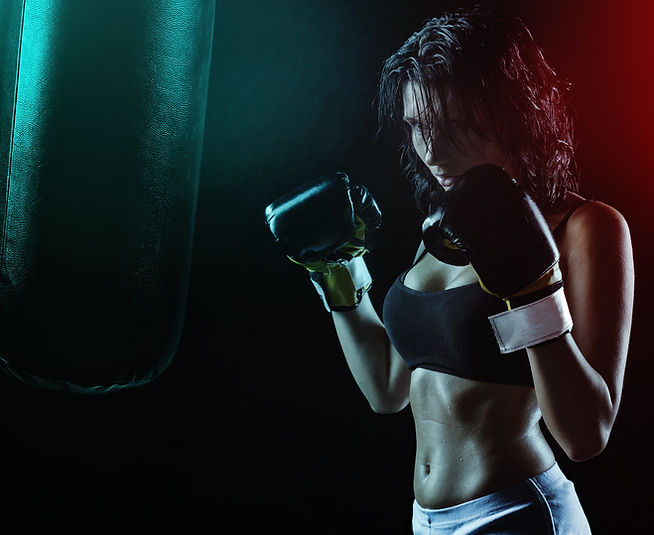 woman-in-boxing-gloves-with-sports-bra-p