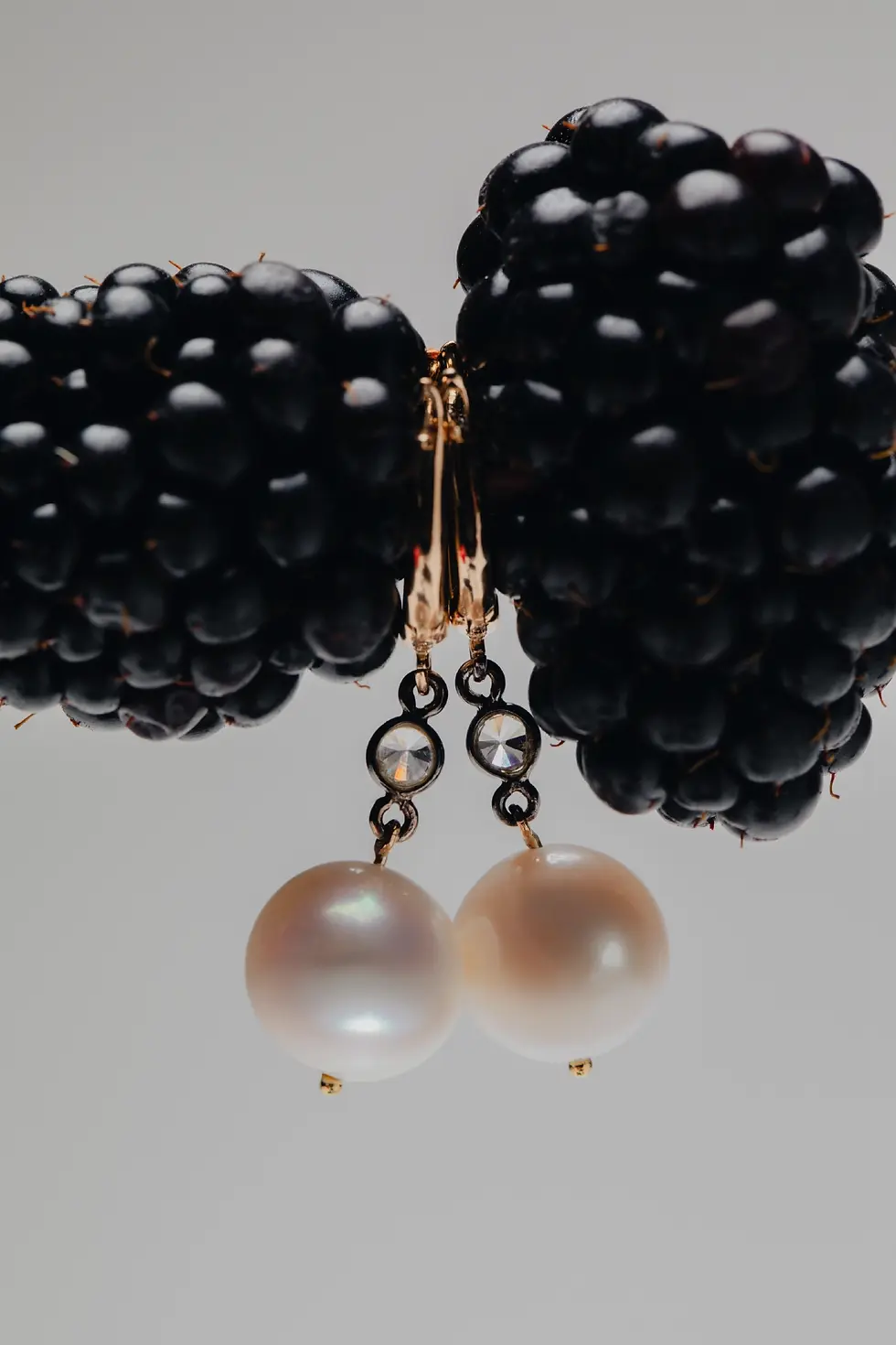 18K gold pearl drop earrings with white sapphire accents and oxidized white-gold links, 8m