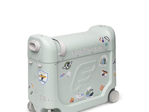 Kid-friendly luxury suitcase with travel stickers for family adventures