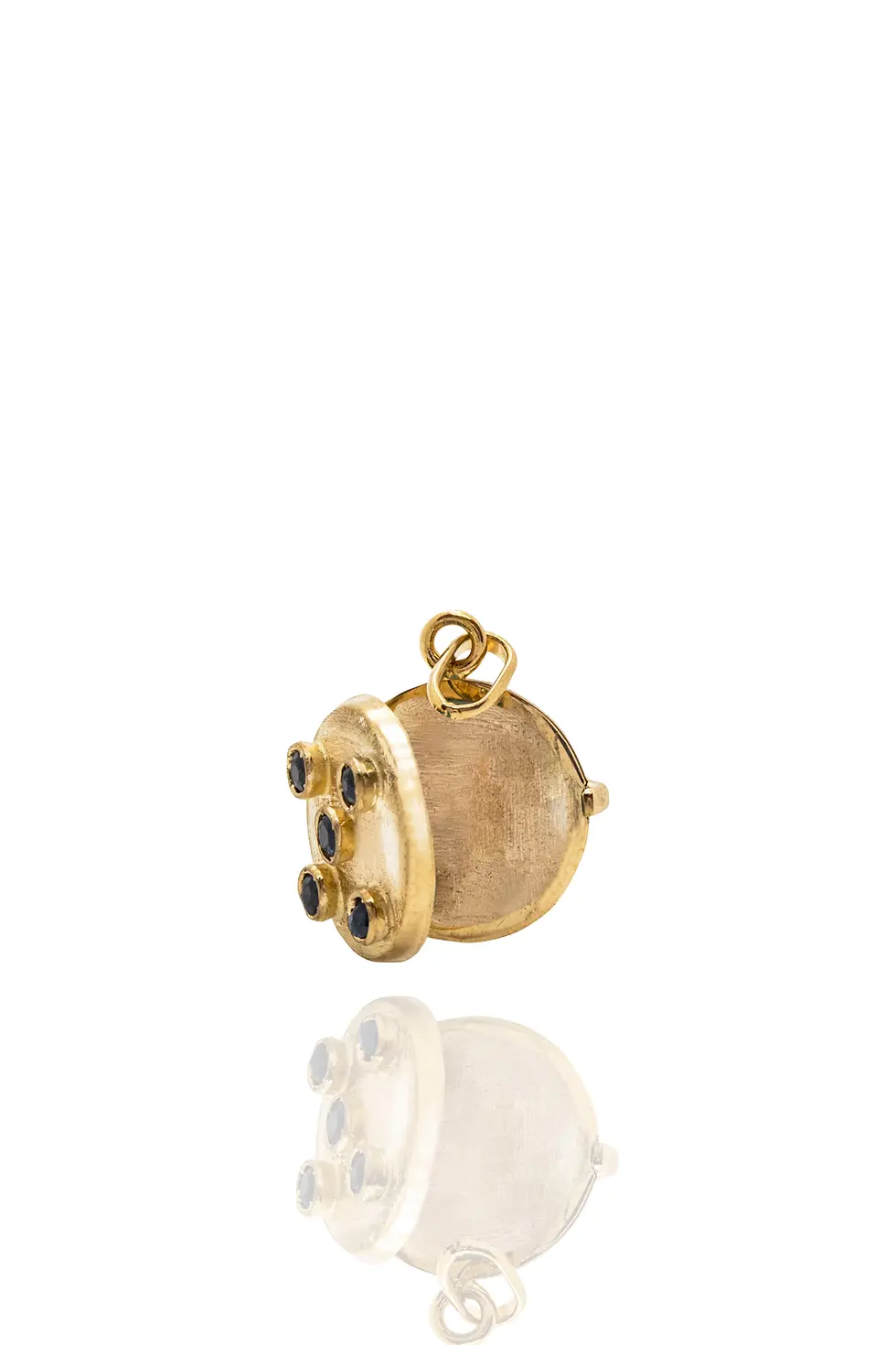 Model wearing gold sapphire locket by Kelly Fletcher Jewelry