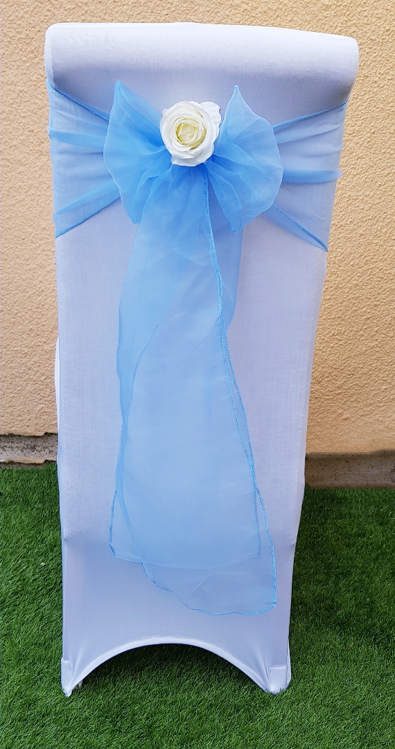 Chair cover with baby blue sash