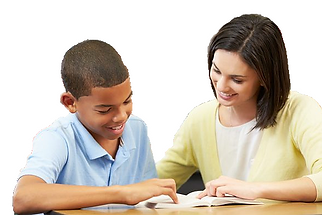A learning specialists tutoring an African American boy