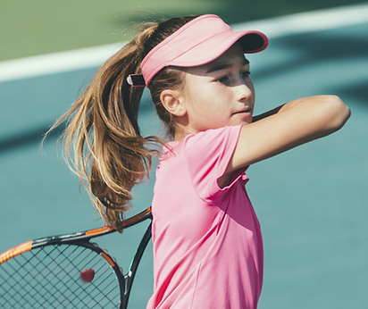 Girl Swinging Racquet