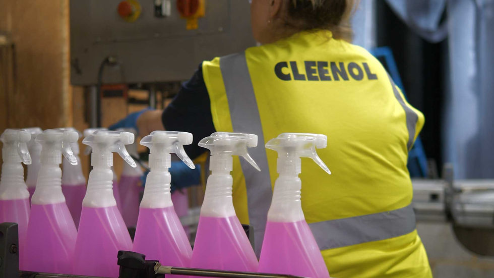 Cleenol shop floor, view behind person in Cleenol safety top