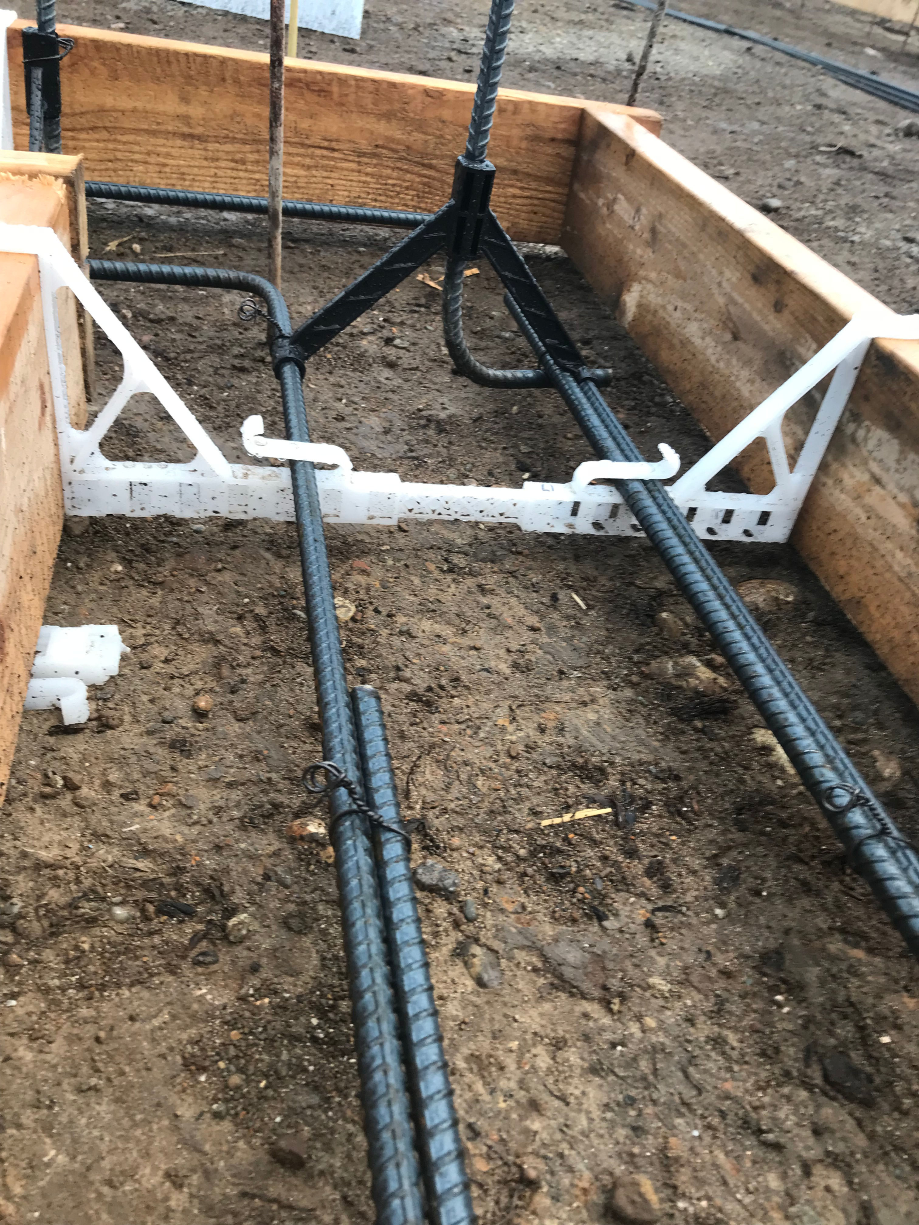 Grabb Barr, Grab Bar, Snappbarr, Snap Bar, Rebar Holder, Rebar Hanger, Holder, Footing brace, tie wire, rebar high chair, cleats, quickformz,  plastipier Forms, concrete, pier grabr,Forming Accessories,Footing Spread, plastipier, Brackets, Spreader Cleat, plastic, hookbar, Concrete Accessories, snapr, Form Plastics,#foundation,J Hooks,#forms,Vertical Rebar, footing, step,Form Plastic, rebar,Concrete Forms, footings, Vertical Rebar Holder, Snappbarr, Snap Bar, Rebar Holder, Rebar Hanger, Holder, Footing brace, tie wire, rebar high chair, home depot, lowes, cleats, quickformz, Concrete Construction, fast footing, concrete construction, concrete supplies, construction, accessories, home depot, lowes, ccinetwork, footing brace, accufooting, building supplies, raw building materials, rebar high chair, concrete accessories for sale, concrete accessories at menards, anchor bolts, rebar tie wire, tying rebar, forming walls, placing concrete, plastic holder, Accufoot, fast footing brace.