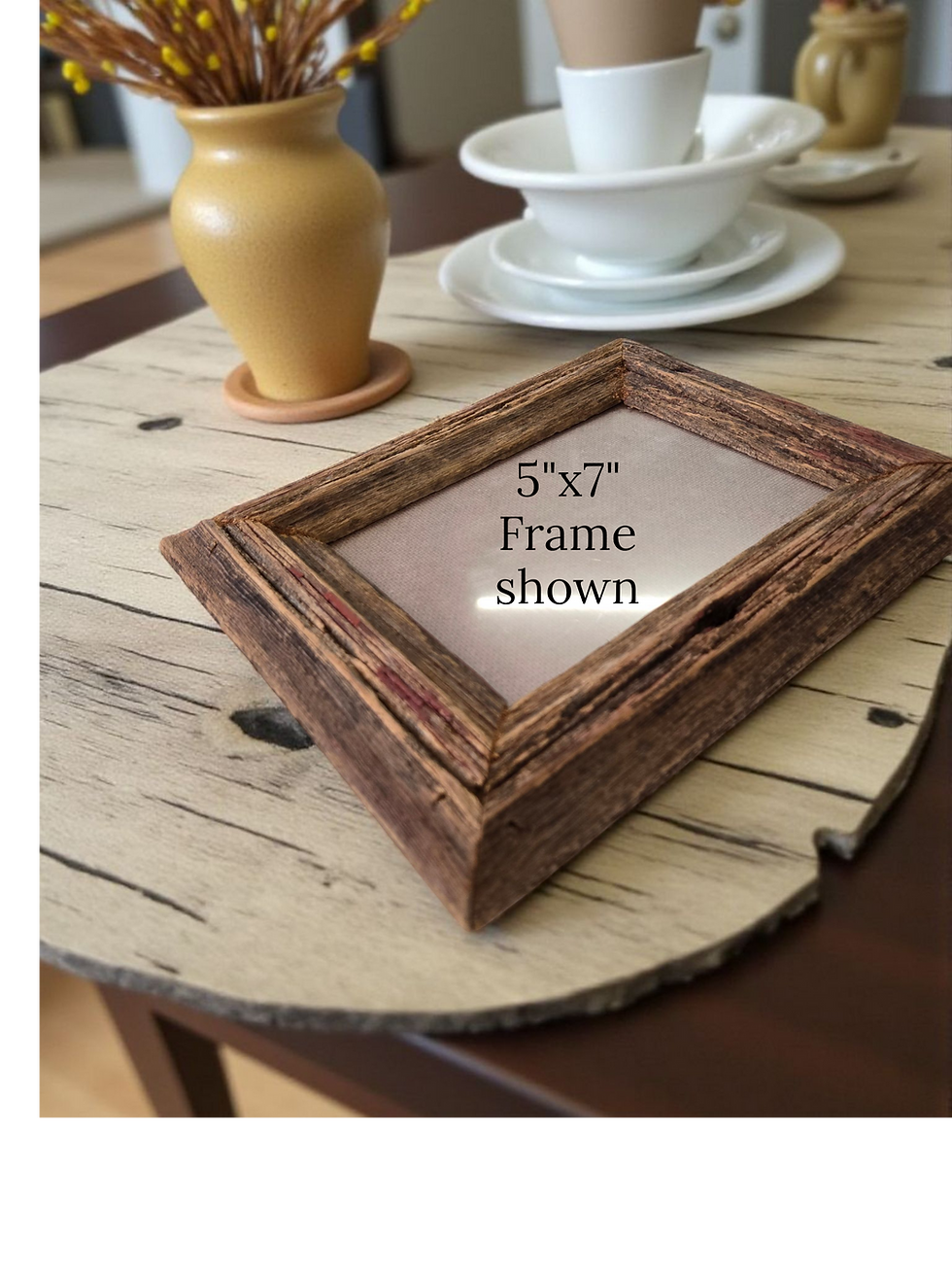 Thumbnail: Handmade rustic barn wood picture frame 5x7 size with natural weathered finish displayed on wooden table.