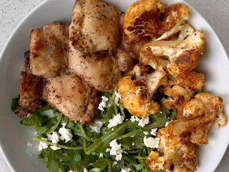 Chicken Thigh and Roasted Cauliflower Bowl with Arugula and Feta