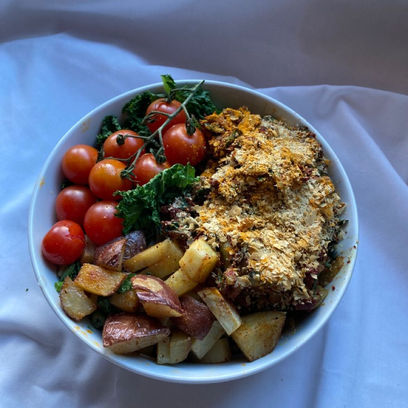 Crispy Chicken Cutlet Bowl with Roasted Potatoes, Kale, and Cherry Tomatoes