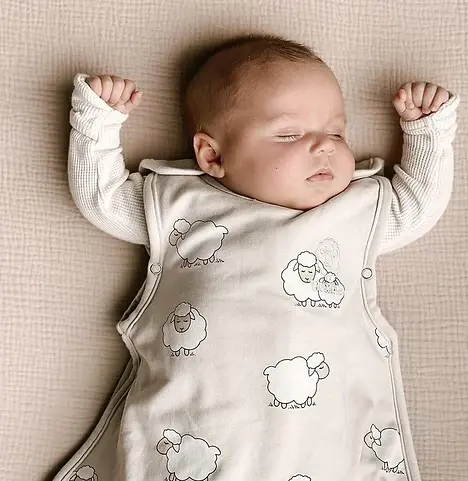 Baby_sleeping_in_a_Woolino_4_season_sleep_sack._From_Pajamas_to_Sleep_Sacks_How_to_Dress_A