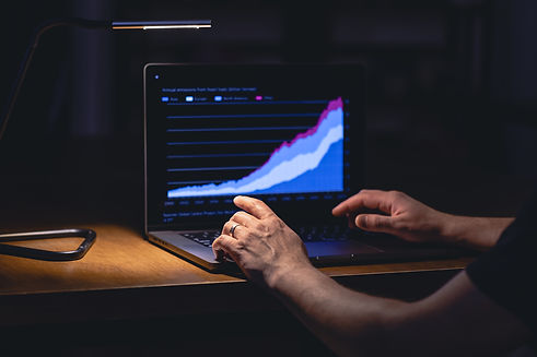 business-man-stock-exchange-trader-looking-laptop-screen-night.jpg