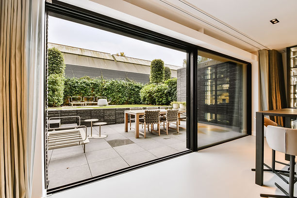 Spaces4You _ Attractive huge sliding glass door leading to the courtyard _ Surrey, UK.jpg