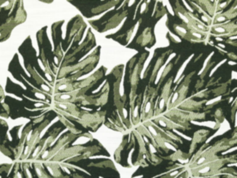 Green Monstera leaf pattern on white indoor/outdoor fabric, UV- and water-resistant.
