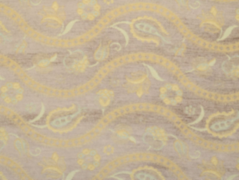 Paisley Dreams in Lavender chenille upholstery fabric with a light purple background and delicate yellow floral accents.