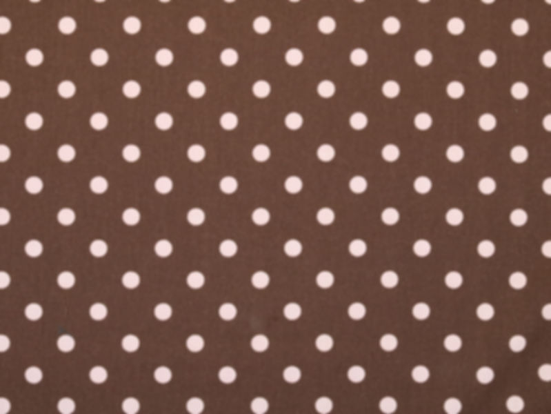 Brown all purpose fabric with light pink polka dots, suitable for drapery or all purpose projects.