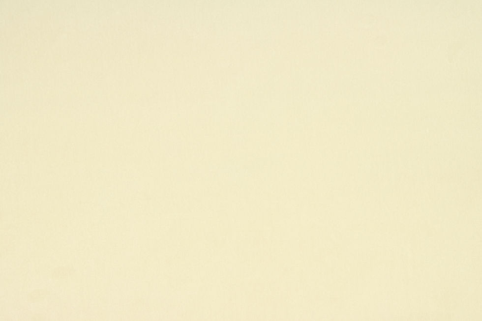 Velvet upholstery fabric in Papyrus, shown in a soft creamy neutral shade with a smooth, luxurious texture.