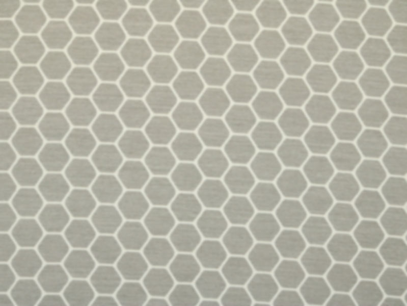 Grey hexagon-pattern indoor/outdoor upholstery fabric.