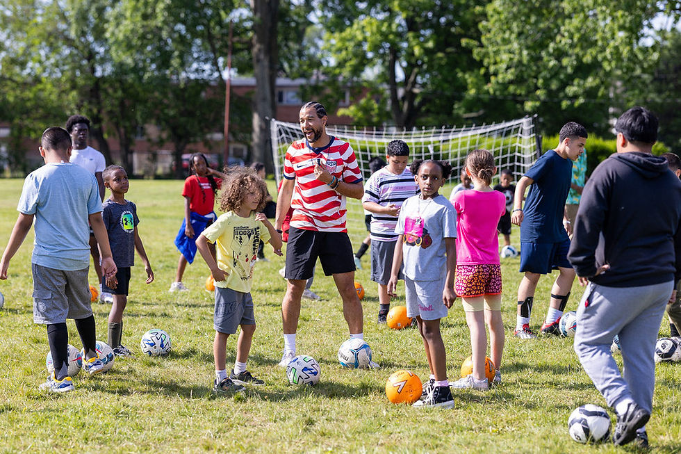 Diverse soccer community gathering at a grassroots football festival in the US