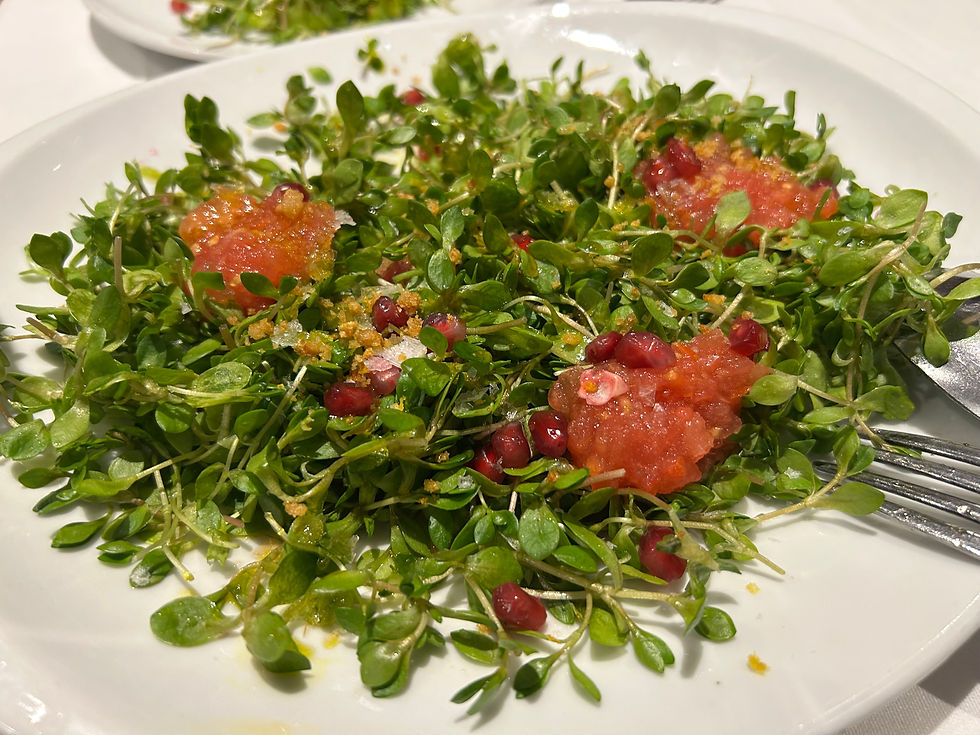 Ensalada de pamplinas con tomate y granada