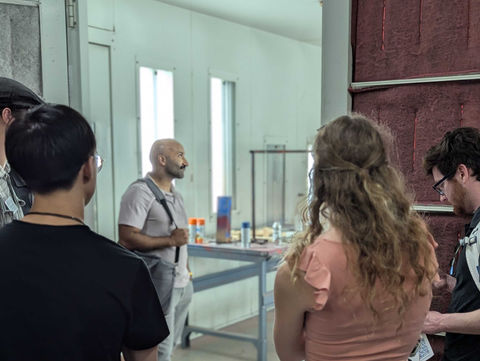 The StartingBlock Madison Hardtech Accelerator cohort visiting UW-Platteville lab and listening to presenter.