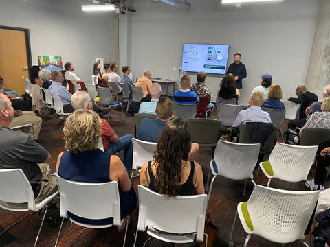Single presenter speaking to an audience in StartingBlock event space.