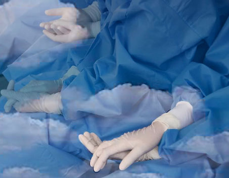 cloudsmergeholdinggloves.jpeg