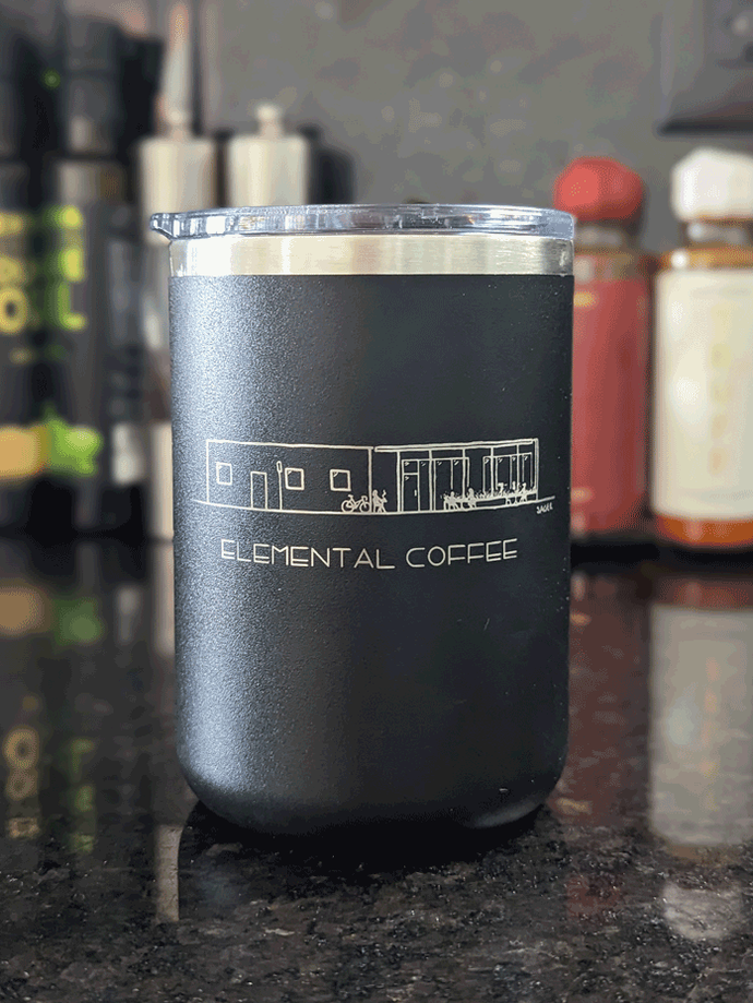Black mug with design of coffee shop