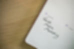 Bullet notebook with 'Social Media Marketing' handwritten inside
