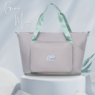 Die Everyday Tasche in Grau Mint. Grauer Stoff mit mint Griffen. 