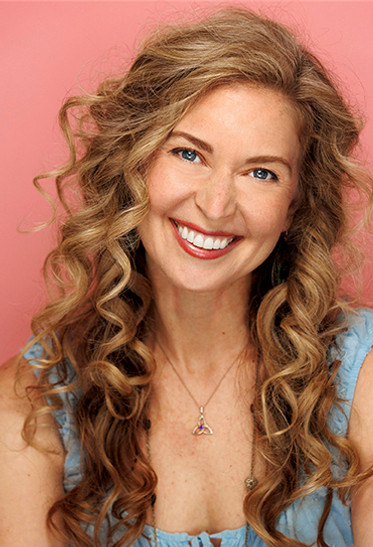 AbbyCarlsonHeadshot2026.jpg