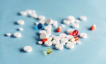 close-up-white-tablets-colorful-capsules.jpg