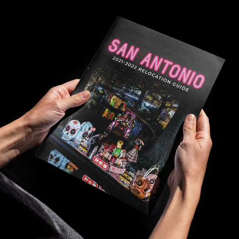 John Vigil's portfolio cover of a man holding the 2021-2022 San Antonio Relocation Guide.