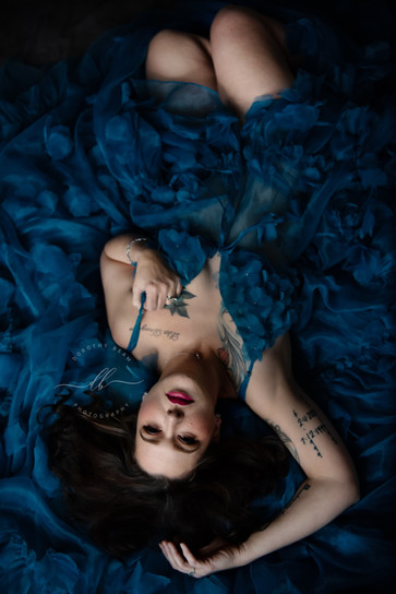 Wise Woman Over 40 Revolution Laying Down in Blue Gown Dayton Ohio Luxury Portrait Photogr