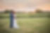 Wedding Northfield MN couple in field sunset golden hour bride and groom