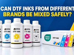 Two bottles of DTF ink from different brands next to a DTF printer, illustrating risks of mixing ink chemistries