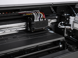  Cross-section diagram showing the core components of a DTF printer, including printhead, ink system, powder shaker, and curing oven