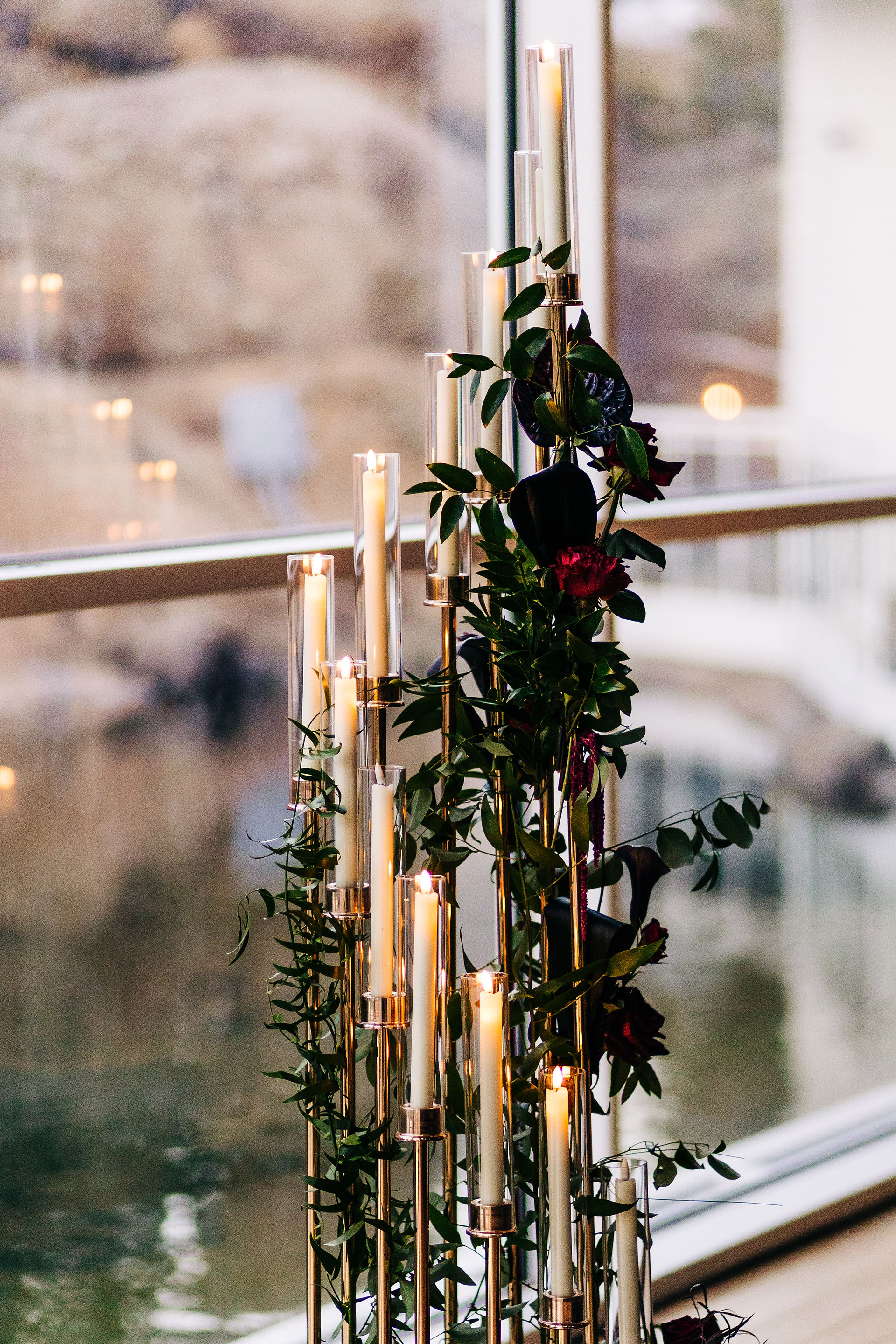 Wedding Candelabra with red and black flowers for elegant macabre wedding at the Stanley Hotel Pavilion in Estes park