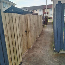 New fence at the side of a house