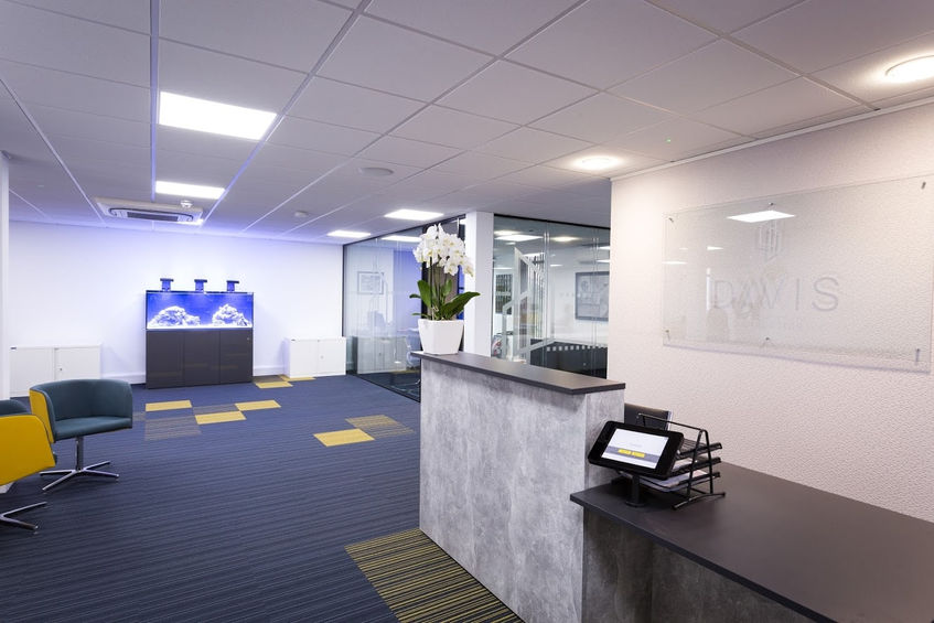 Modern workplace designed by a commercial fit out company with reception area, meeting spaces and flexible office layouts