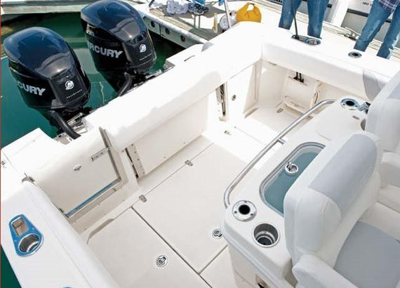 The spacious rear deck of the Bonnie Lee of Sandhill Charters with the rear bench seat folded