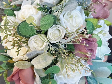 Artificial autumn bridal bouquet with warm rustic tones