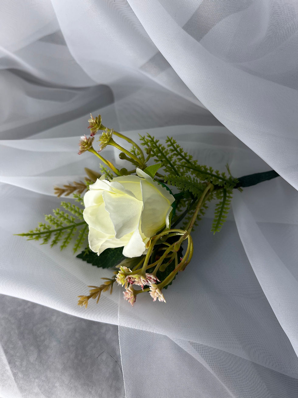 Thumbnail: Cream rose boutonniere with greenery