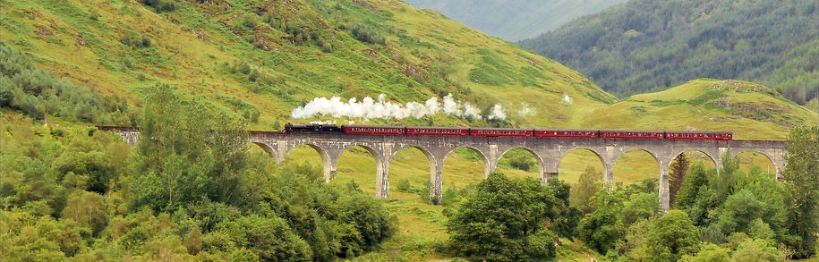 scotland- steam train railway bridge hills ben green