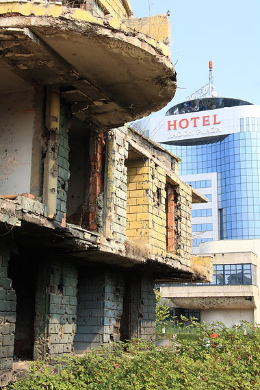 War damage next to a brand new hotel